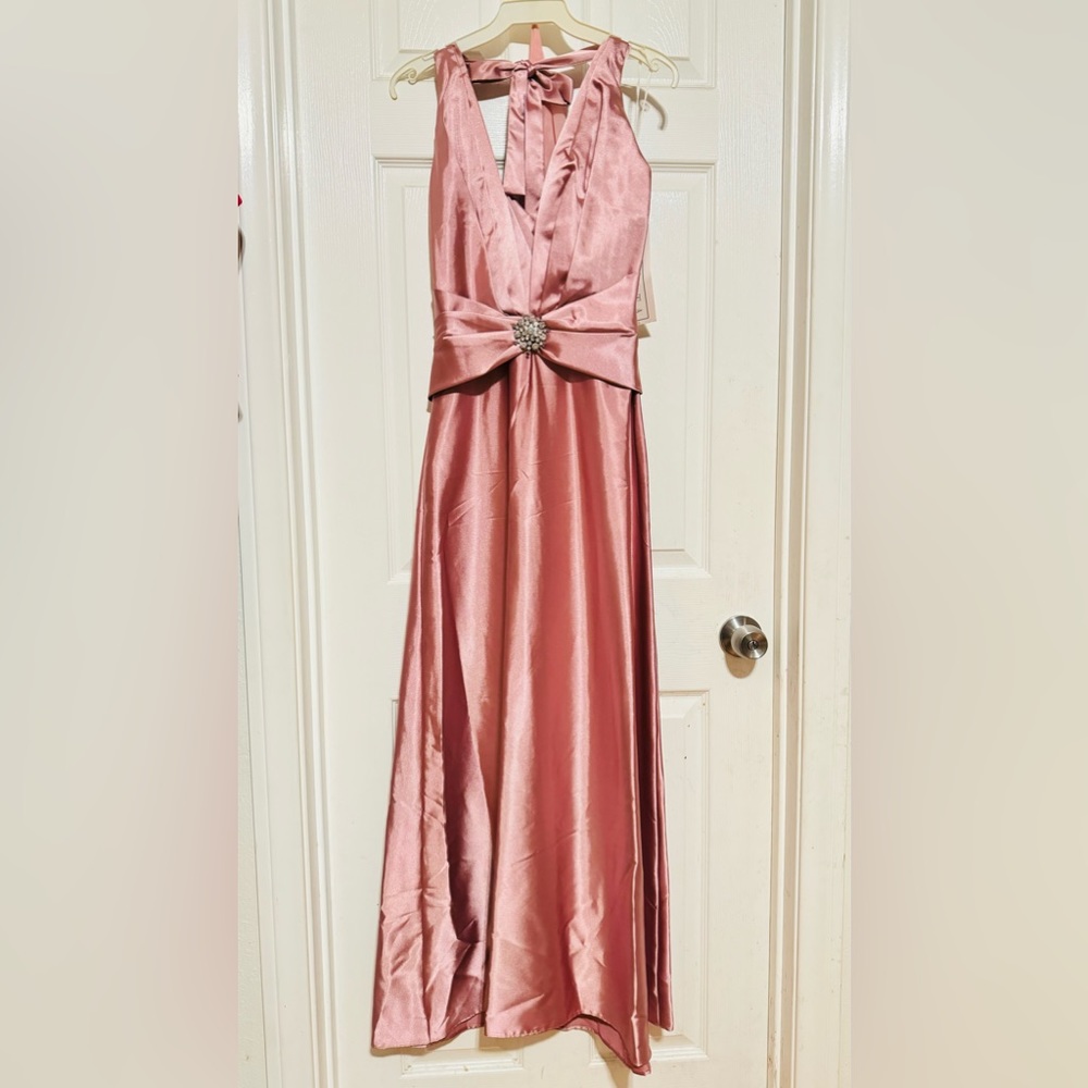 Beautiful dress for any occasions so soft and comfortable. new with tags on.